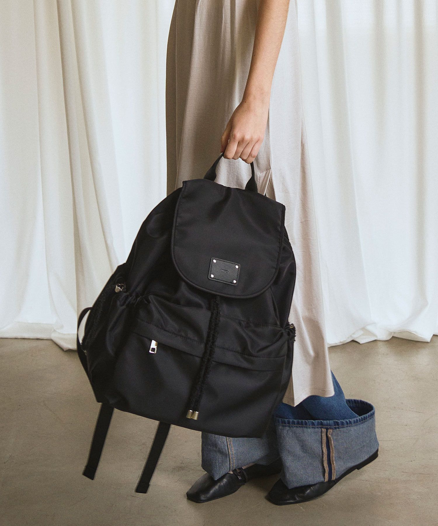 MUSINSA公式 | MUR Fluffy String Backpack (recycle nylon black)