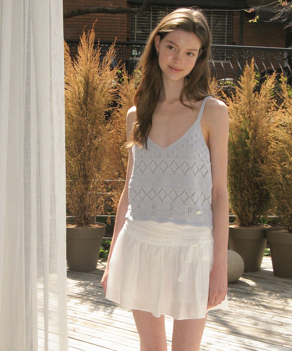 썸웨어버터(SOMEWHEREBUTTER) Wendy Linen Mini Skirt - Ivory