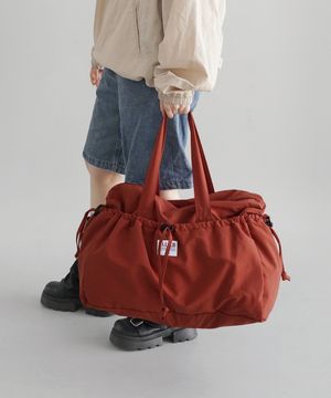 스트링 포켓 보스턴 트래블백 - brick red