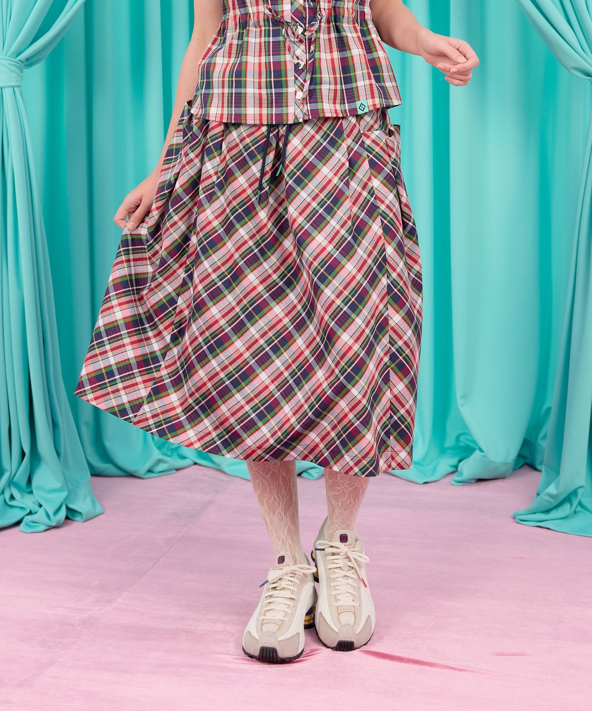 헤레틱(HERETIC) BUTTON VOLUME SKIRT / check-red