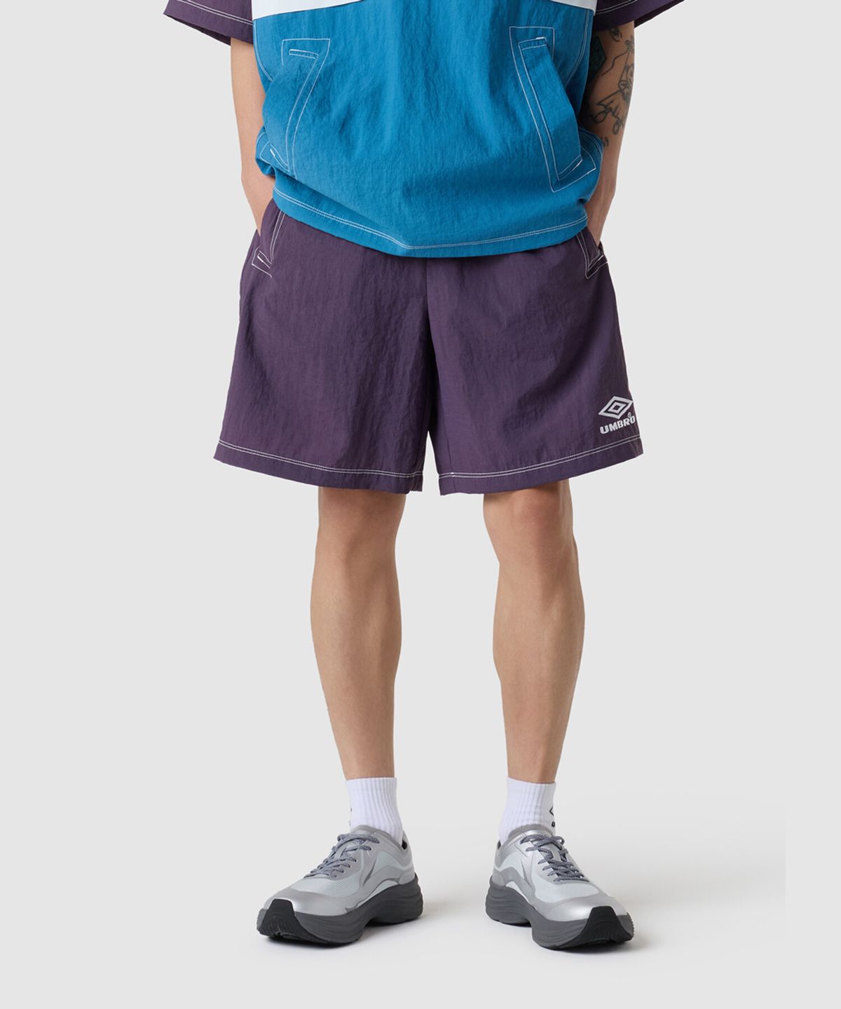 엄브로(UMBRO) 크리스피 타슬란 4.5부 반바지 퍼플(UQ223CHP59)