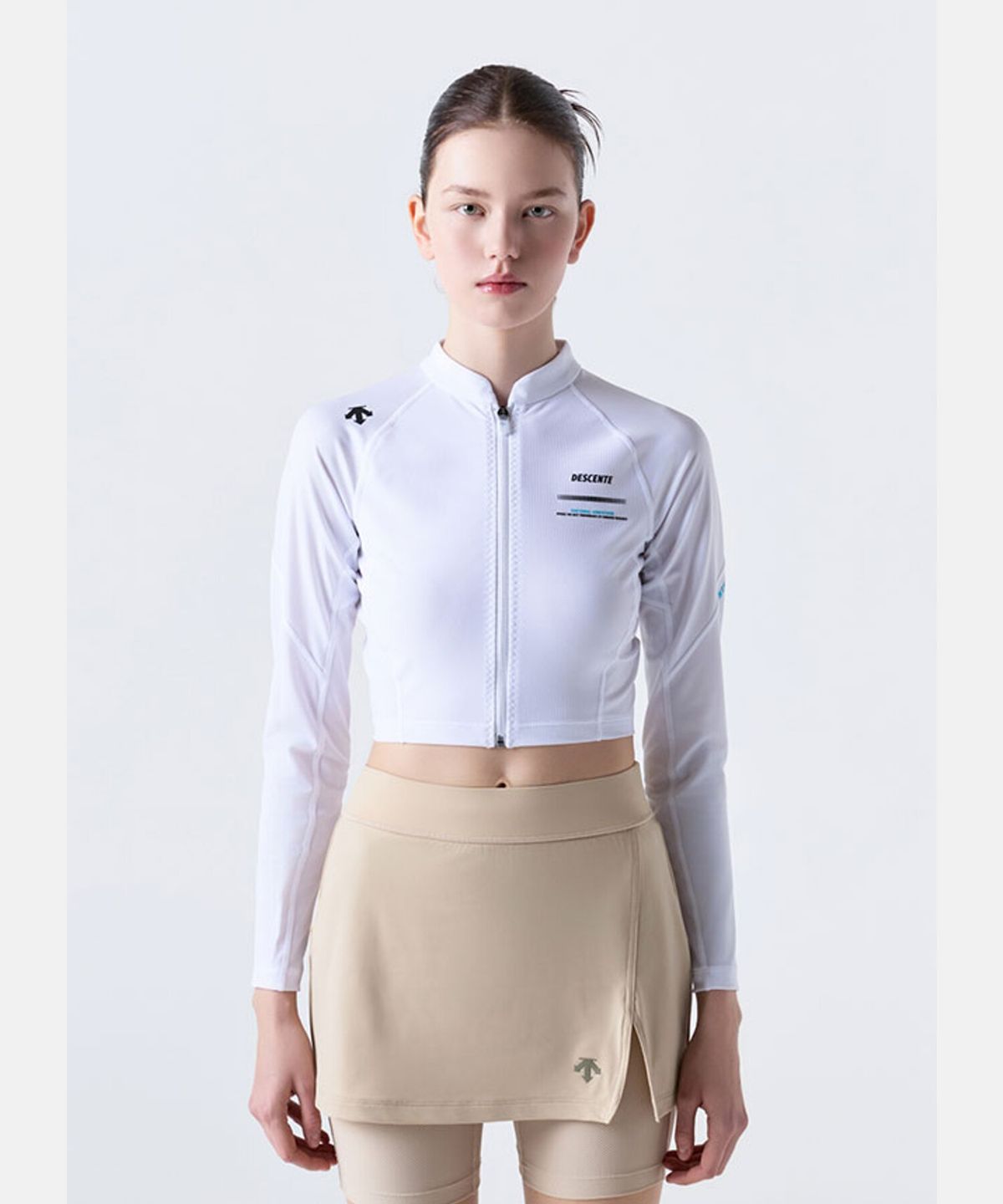 데상트(DESCENTE) 우먼스 크롭 래쉬가드 화이트(SQ222EKT53)