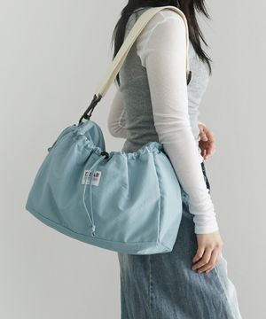 커들리 스트링 포켓 크로스백 - skyblue
