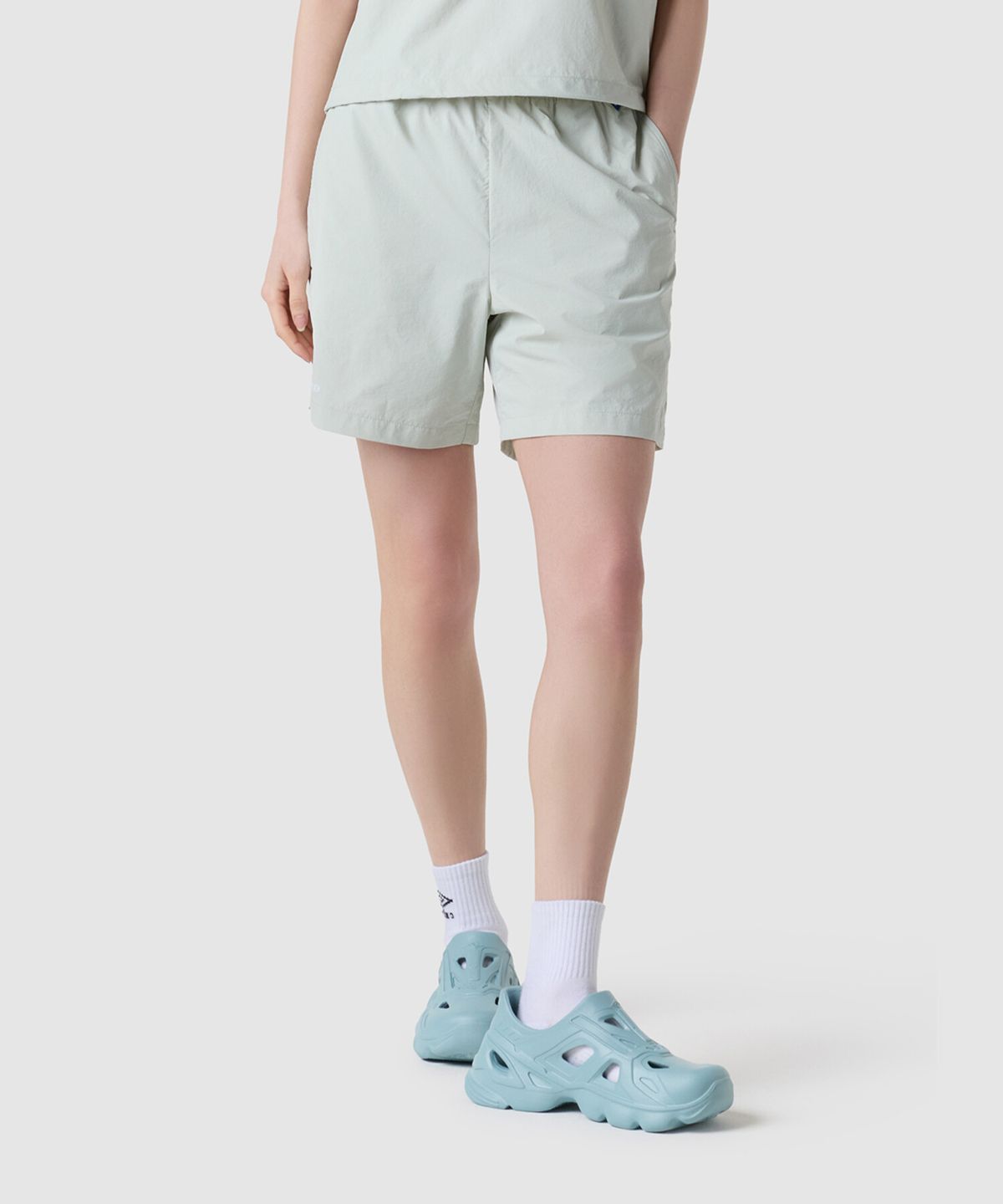 엄브로(UMBRO) 라이트브리즈 쿨링 4.5부 반바지 베이지(UQ223CHP66)