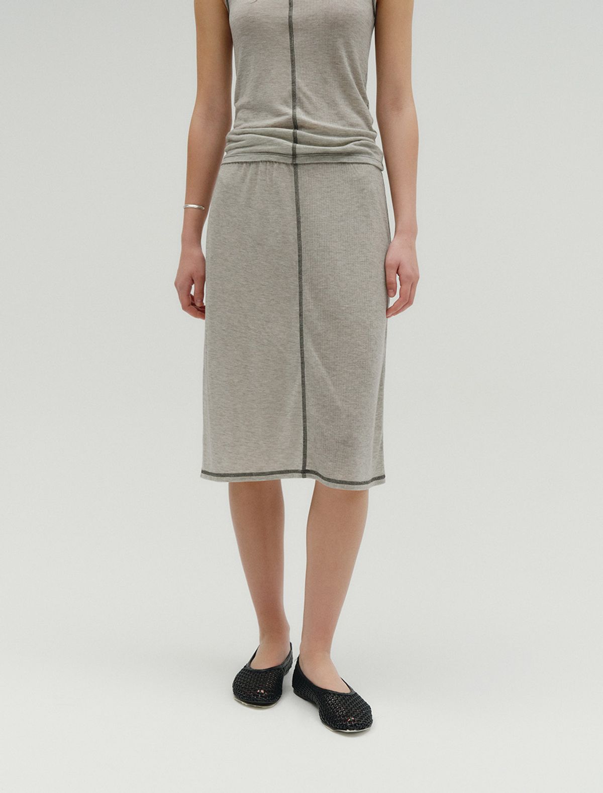솔티페블(SALTY PEBBLE) HALF & HALF SKIRT [MELANGE GREY]