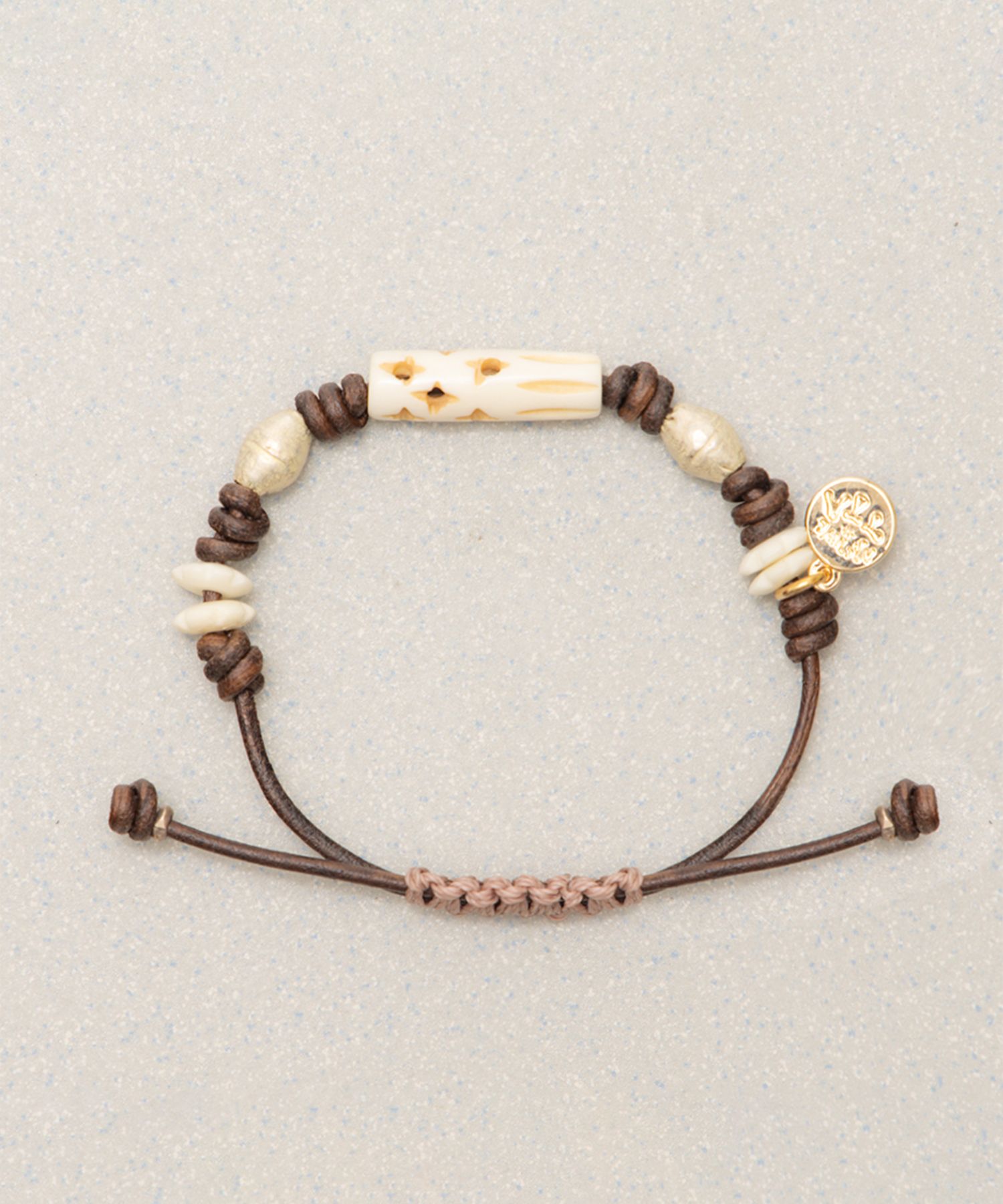 【韓国のみ】 Towtow.archive Paisley Symbol Bracelet MUSINSA | TOWTOW ARCHIVE Paisley Symbol Bracelet Ivory