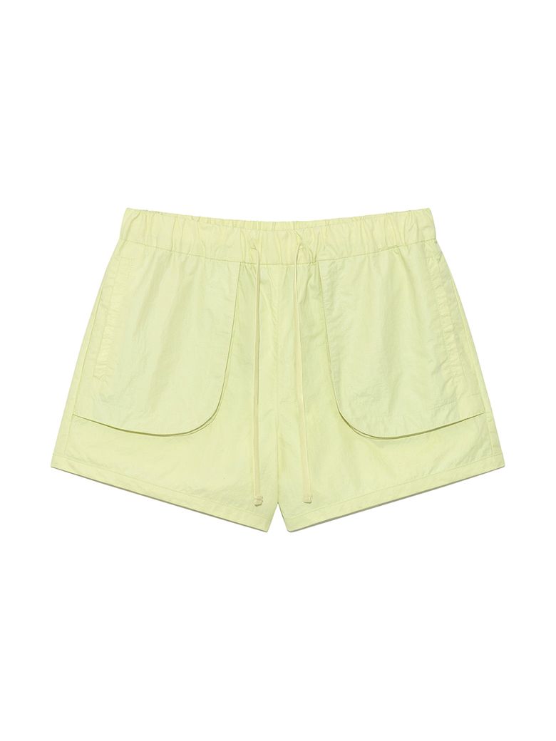 OUT POCKET NYLON BANDING SHORTS IN LIME