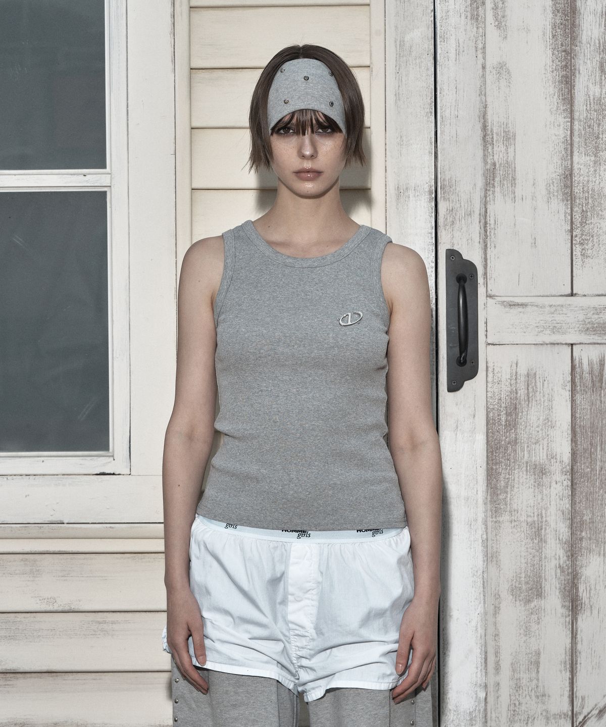 일리오(ILLIO) Gray Symbol ribbed sleeveless top