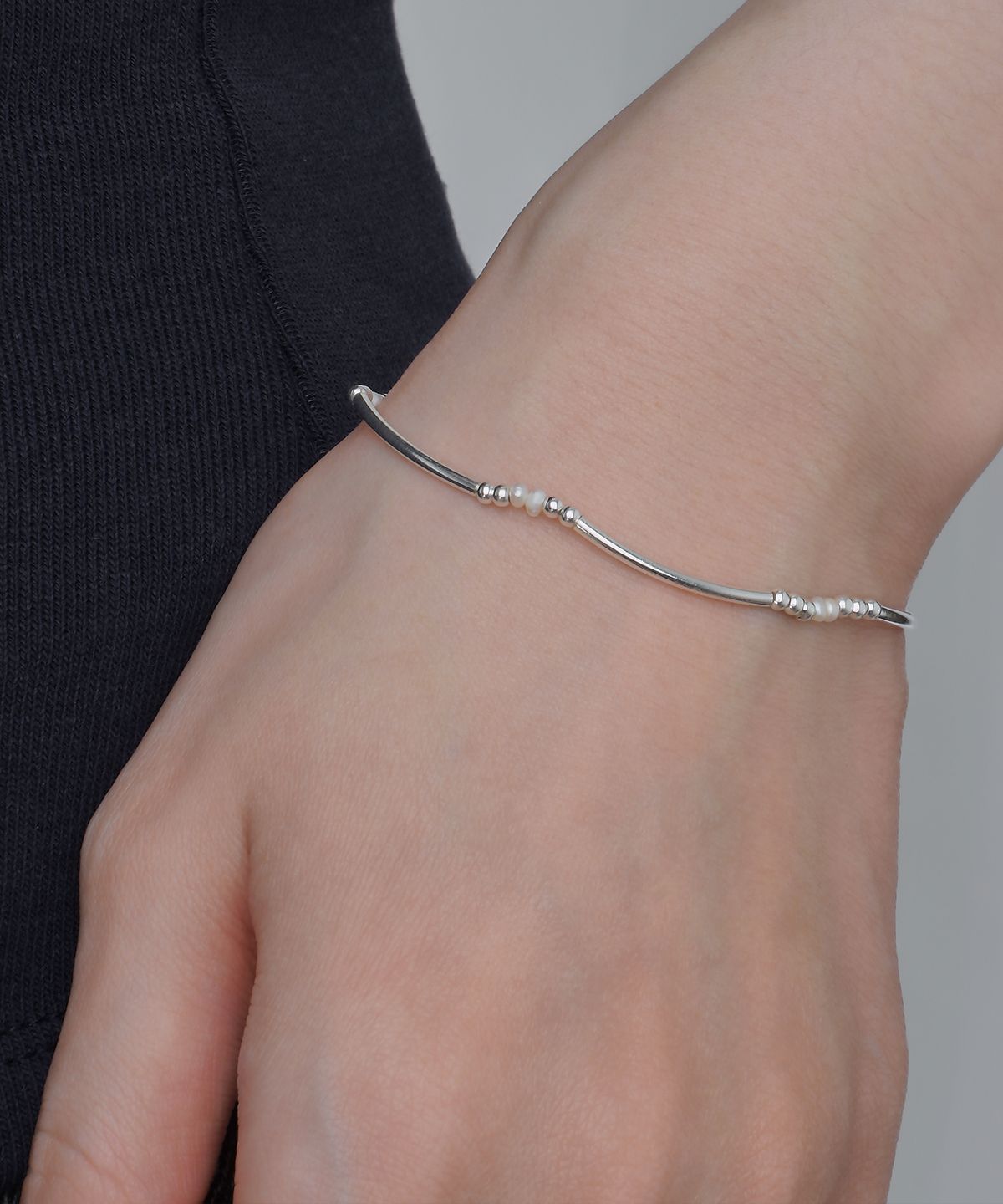 포스트루드(POSTLUDE) [SILVER] PIPE MINI BALL PEARL BRACELET
