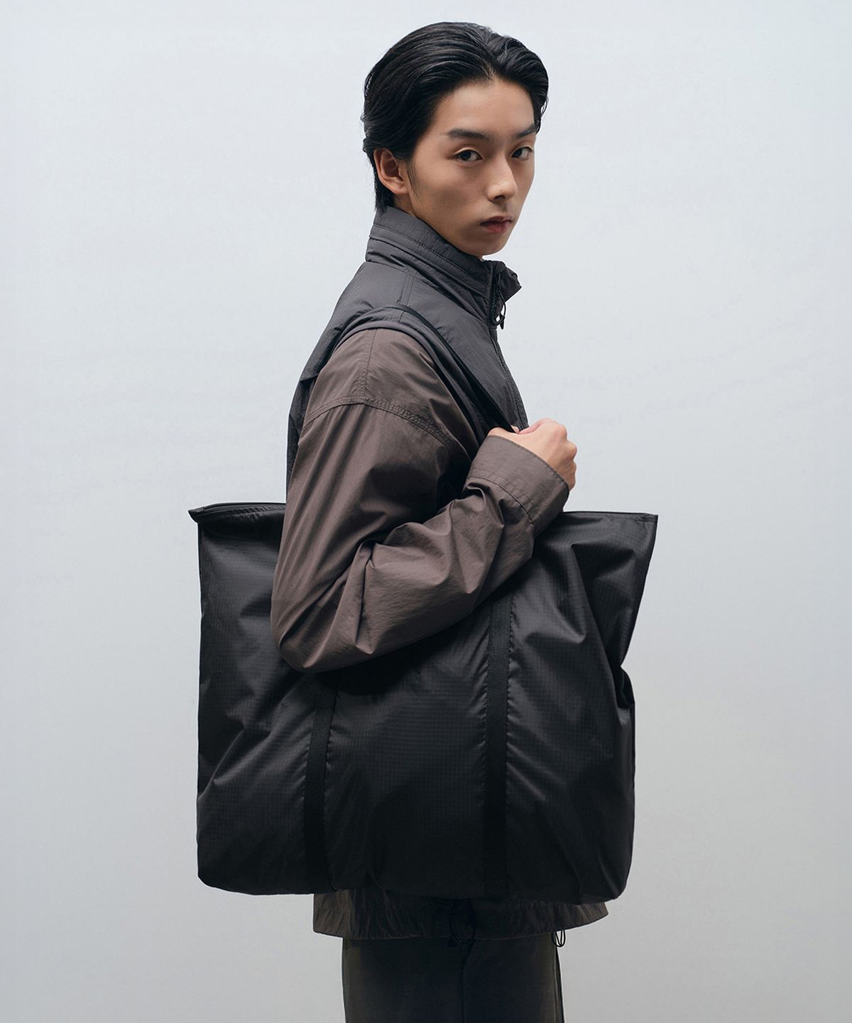 무신사 스탠다드(MUSINSA STANDARD) 립스탑 패커블 토트 백 [블랙]