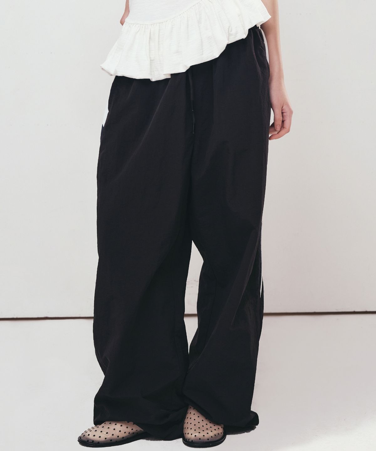 닉앤니콜(NICK&NICOLE) PIPING TRACKSUIT PANTS_BLACK