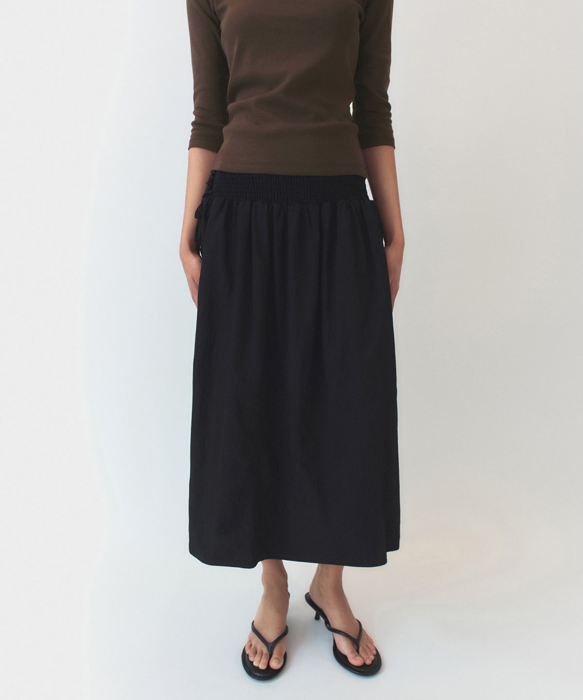 시메트릭 퍼센트(SYMMETRICPERCENT) Smocking Skirt / Black