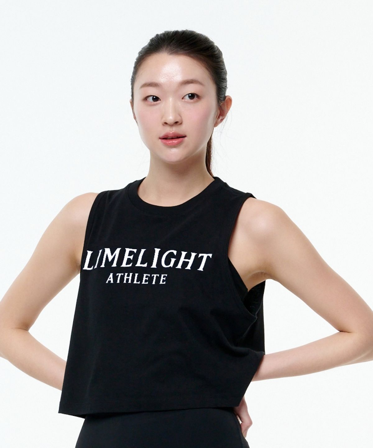 라임라잇 어패럴(LIMELIGHT APPAREL) 애슬릿 우먼즈 크롭 슬리브리스 (블랙/화이트)