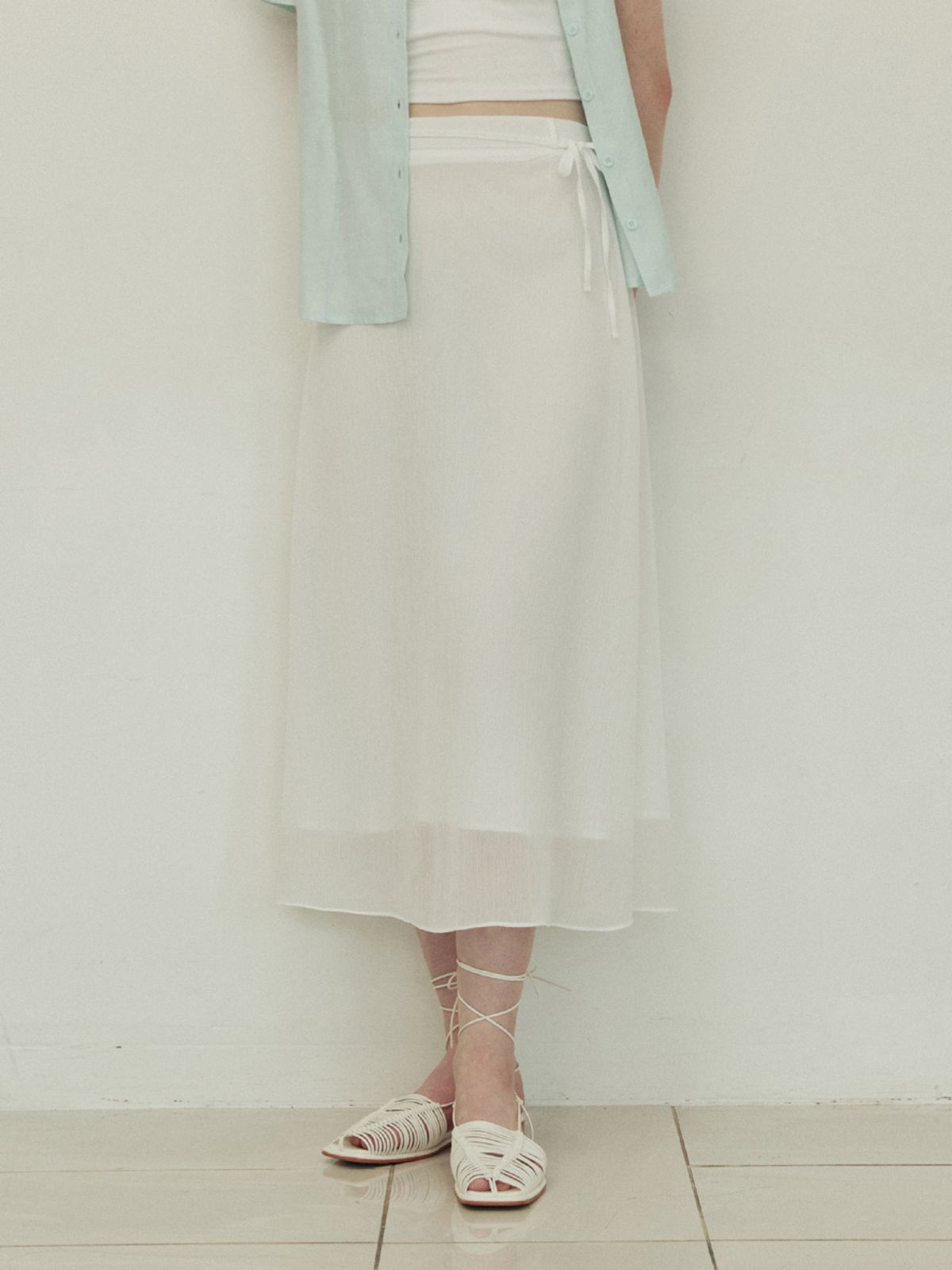 어다울(ADAUL) Double line ribbon strap long flare skirt - white