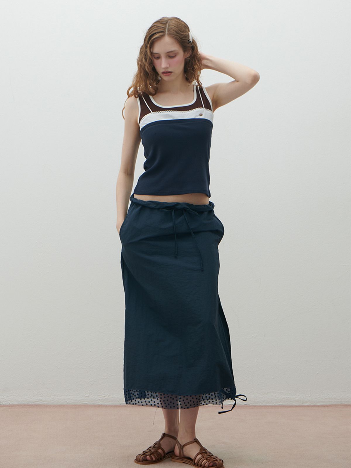 더블힙스(HHIPS) 도트 배색 나일론 스커트(navy)