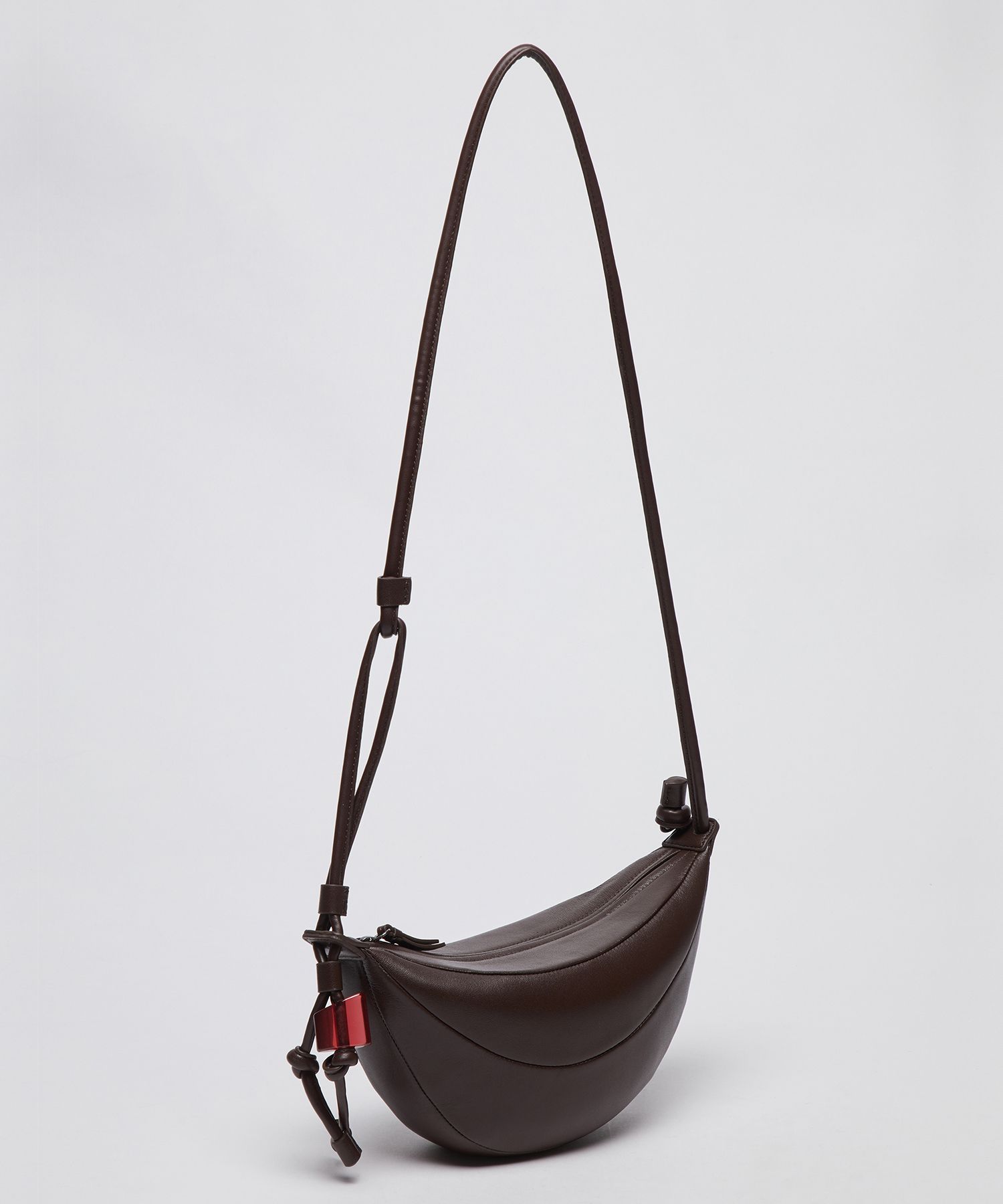 MUSINSA | Archivépke Small fling bag(Choco spread)_OVBAX26001DKB