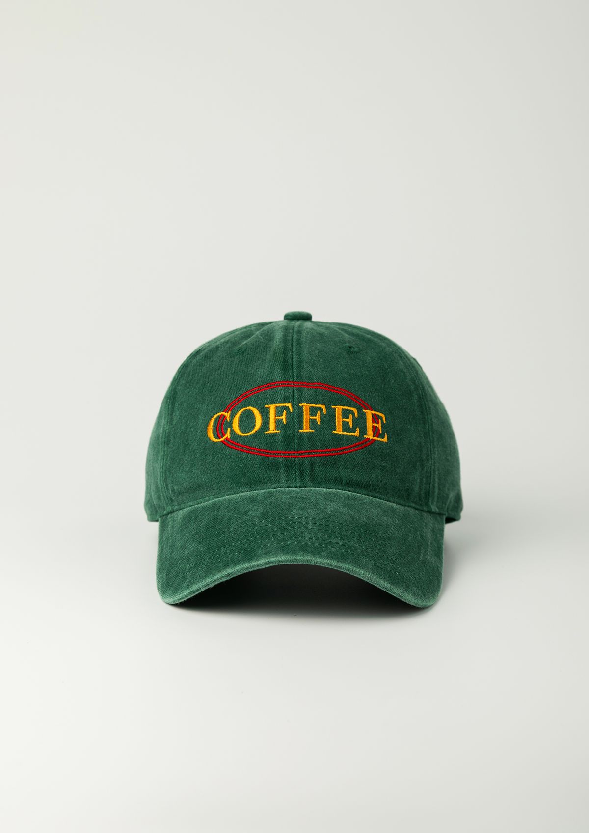 모닝커피런클럽(MORNINGCOFFEERUNCLUB) 커피 원형 로고 스톤 워시드 볼캡 그린
