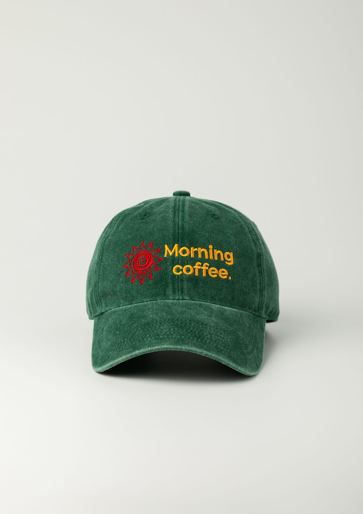 모닝커피런클럽(MORNINGCOFFEERUNCLUB) 모닝 커피 썬 로고 볼캡 스톤 워시드  그린