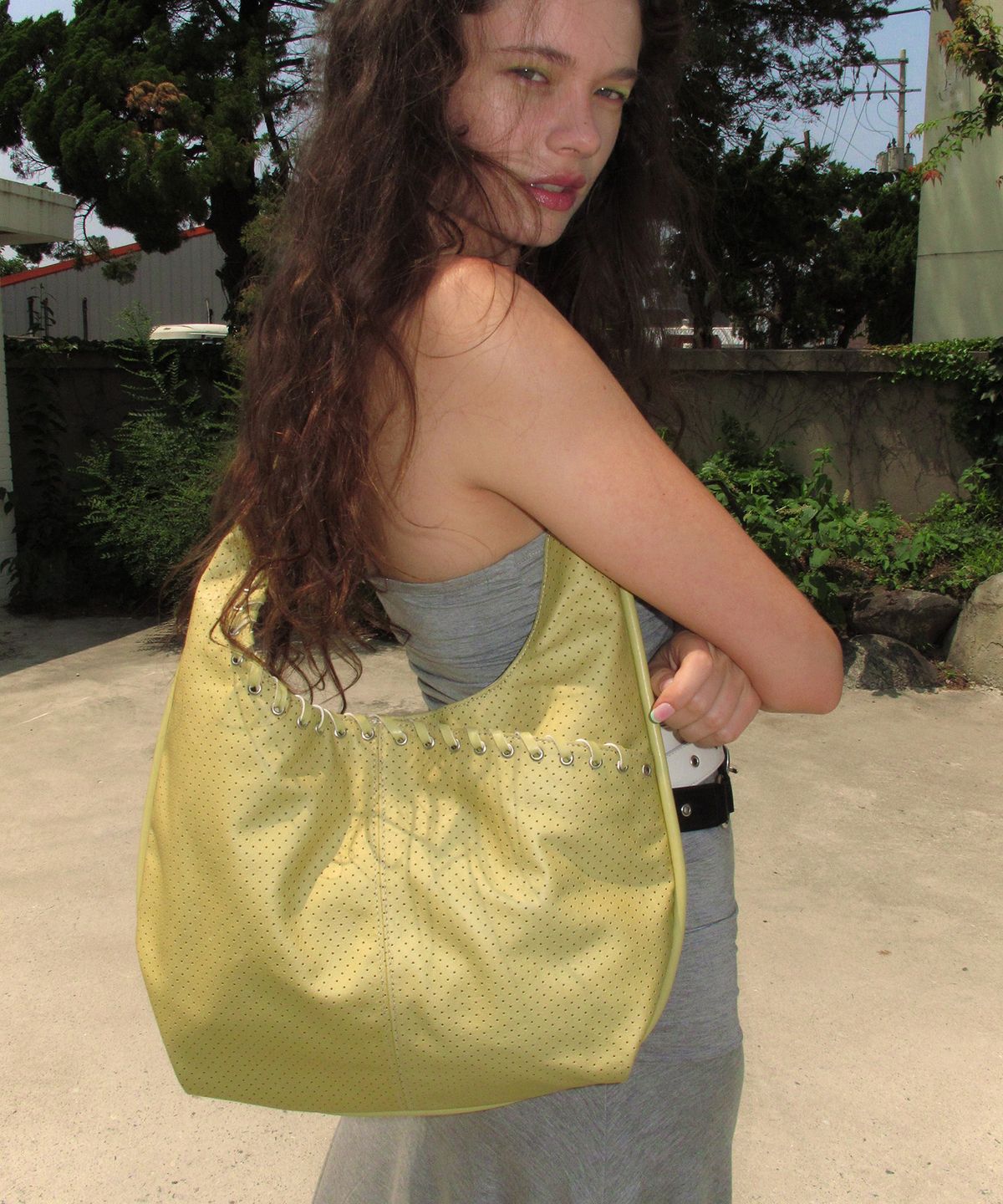 여밈(YEOMIM) medium slash hobo bag (punching butter)
