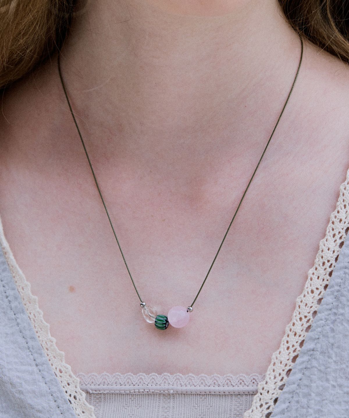 메리모티브(MERRYMOTIVE) Natural mood gem with string necklace
