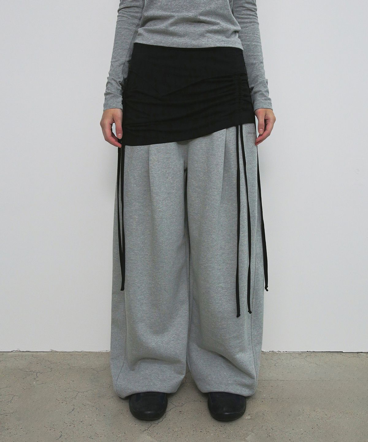 샌드릭(SANDRIC) LAYERED STRING MINI SKIRT_BLACK