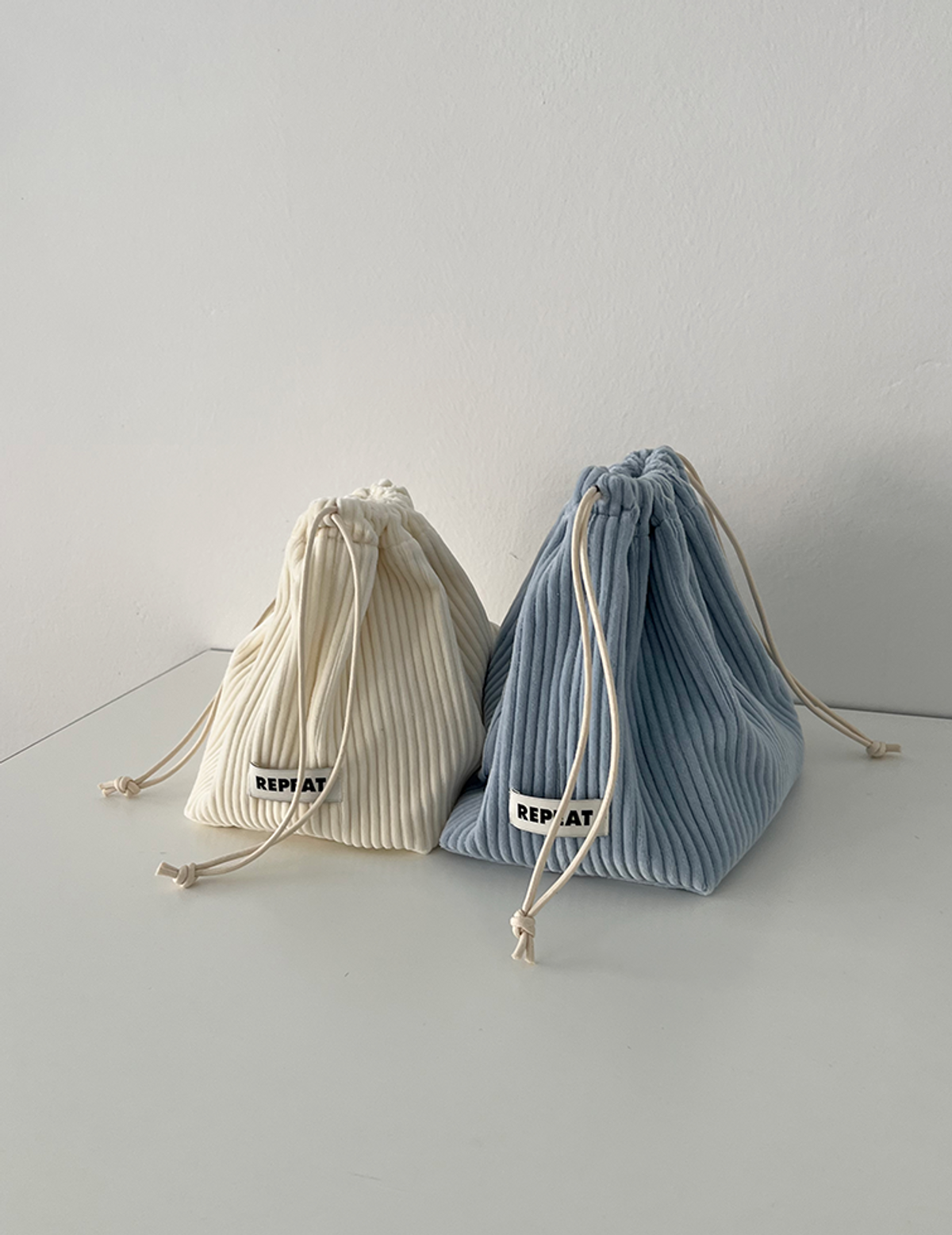 리핏(REPEAT) 파우더리 스트링백 파우치 (5colors)