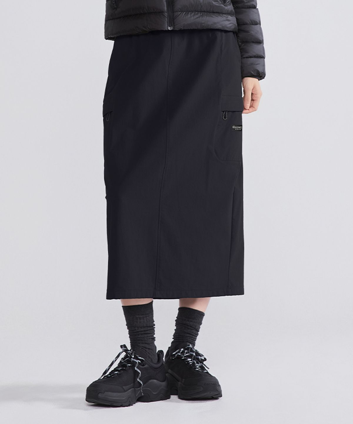 디스커버리 익스페디션(DISCOVERY EXPEDITION) 여성 파라슈트 스커트 (BLACK)