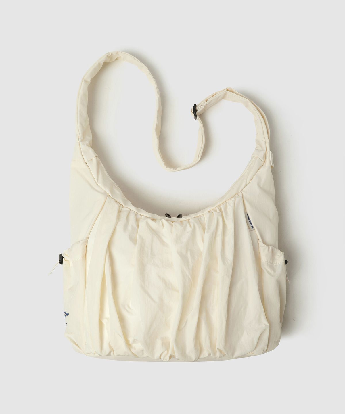 엄브로(UMBRO) 글로시 셔링백 베이지(UQ322CBG91)
