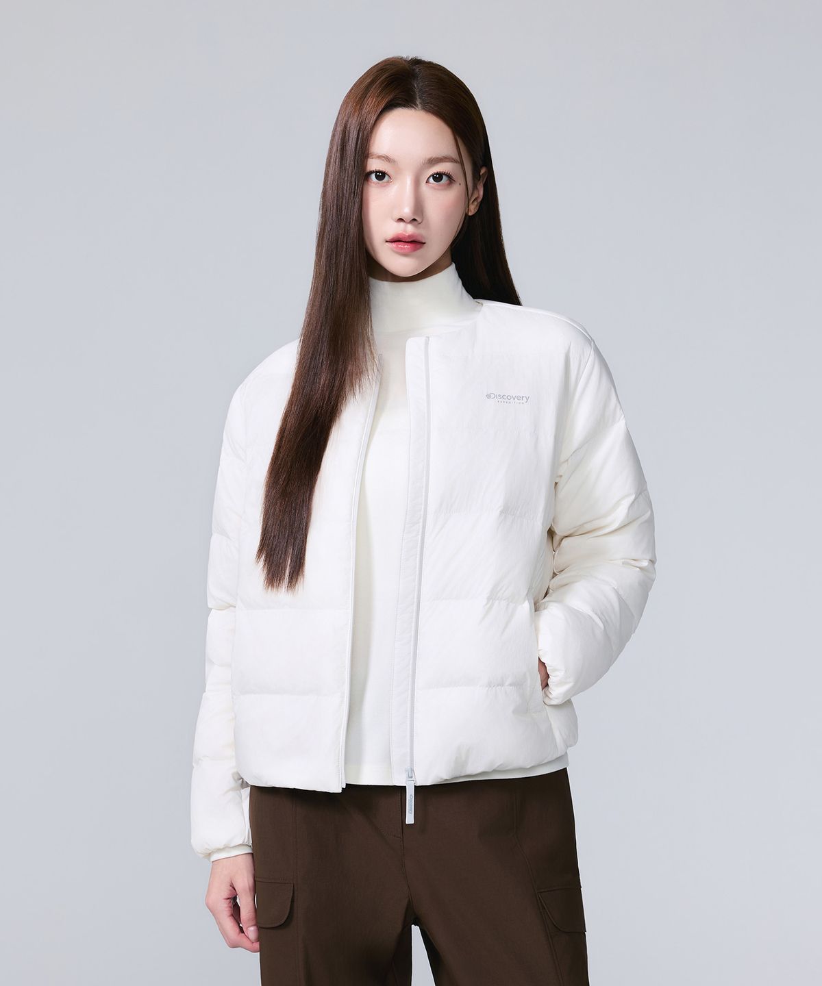 디스커버리 익스페디션(DISCOVERY EXPEDITION) 여성 픽토르U 구스다운 경량패딩 (CREAM)