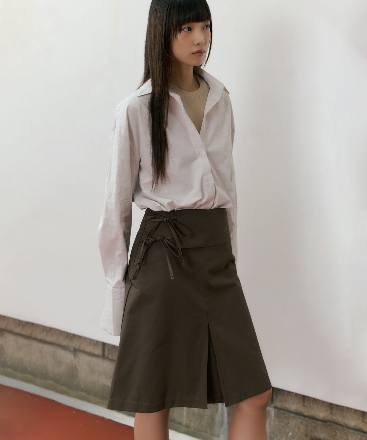 리올그(REORG) REF DOUBLE RIBBON SKIRT ASH BROWN