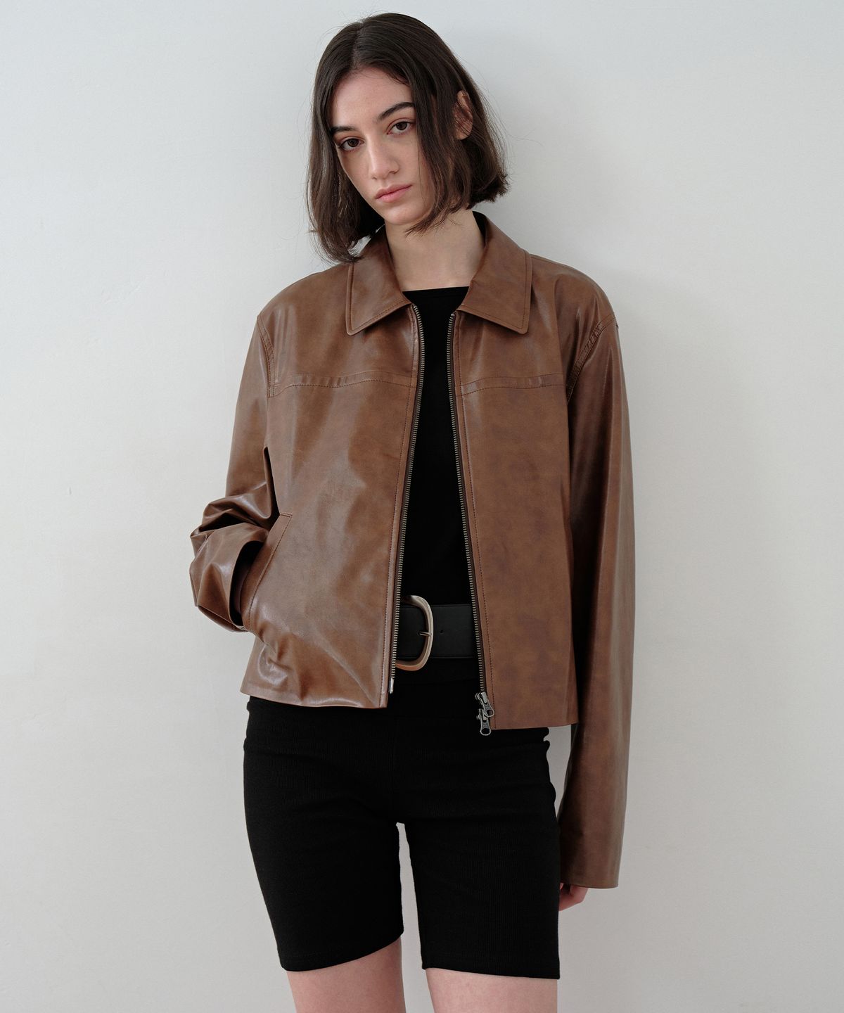 시메트릭 퍼센트(SYMMETRICPERCENT) Minimal Faux-leather Jacket / Brown
