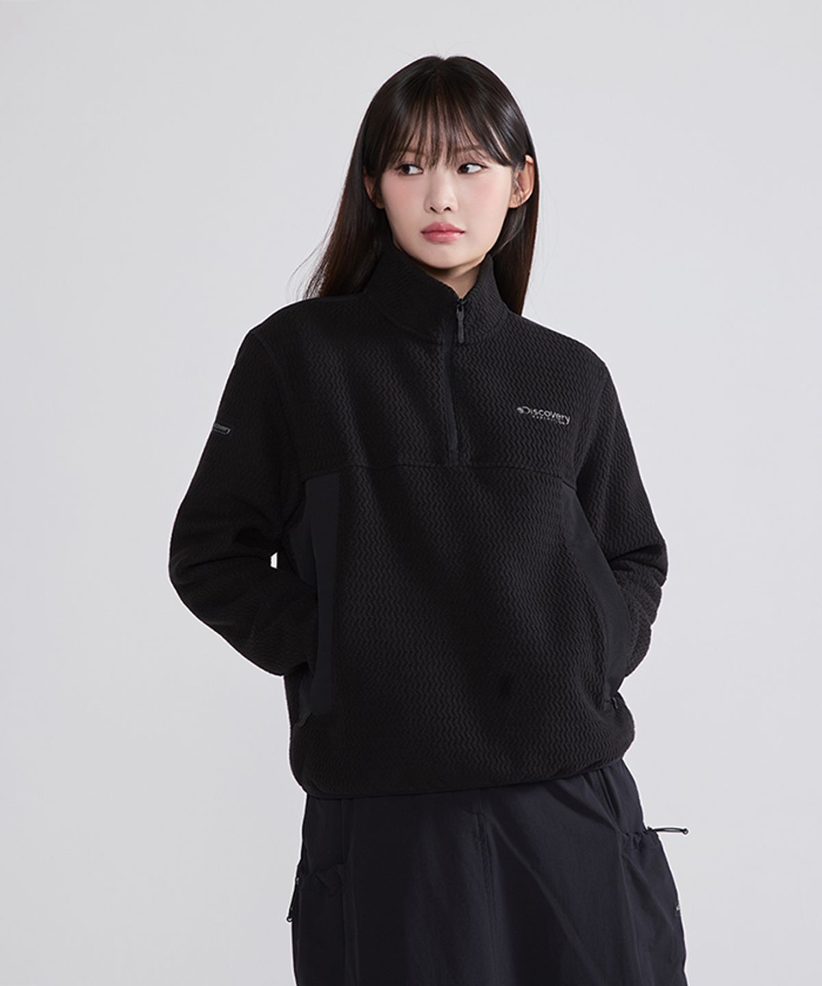 디스커버리 익스페디션(DISCOVERY EXPEDITION) 여성 자가드 플리스 반집업 티셔츠 (BLACK)