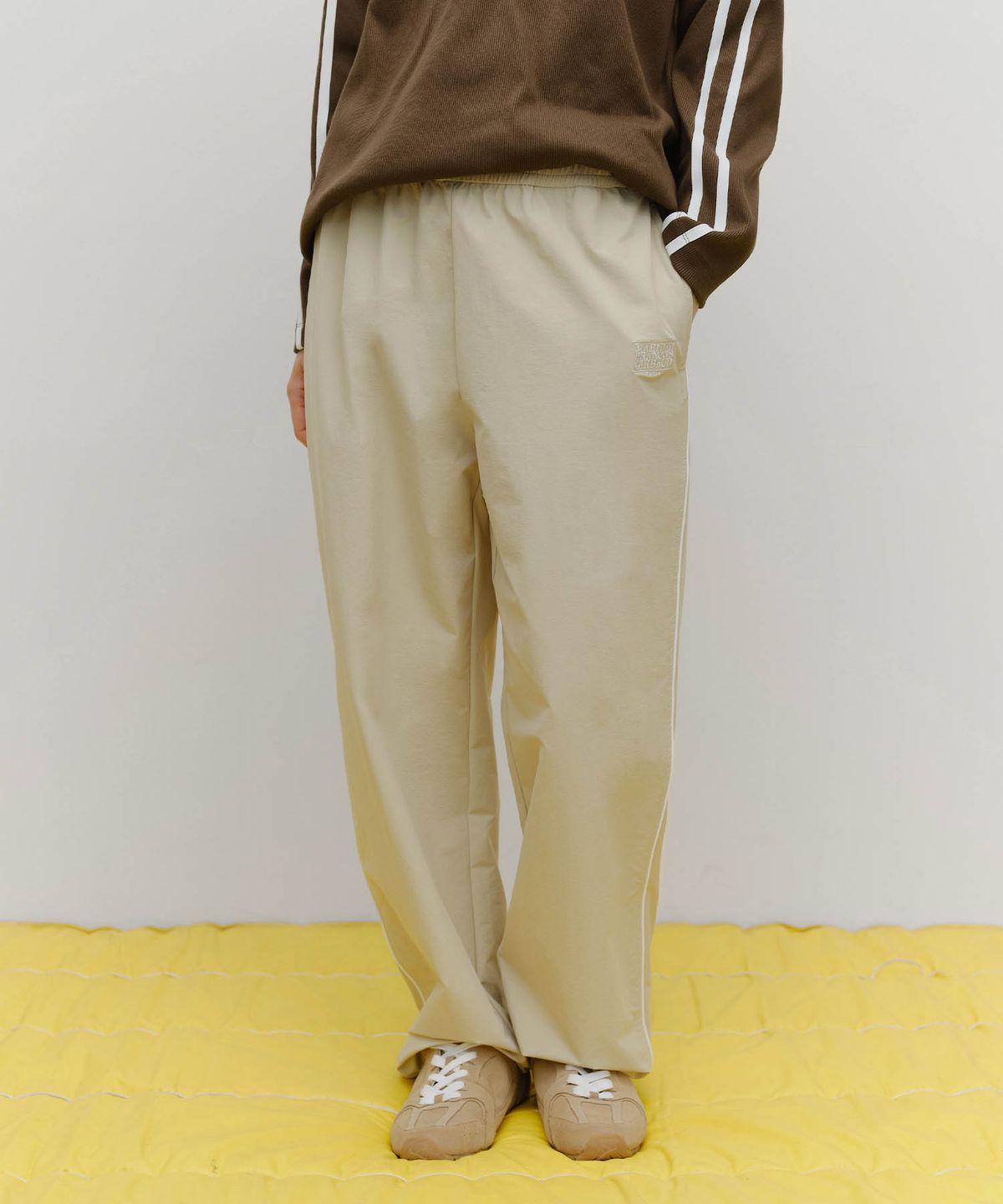 마리떼 스포츠(MARITHÉ SPORT) MARITHE SPORT NYLON TRACK PANTS beige