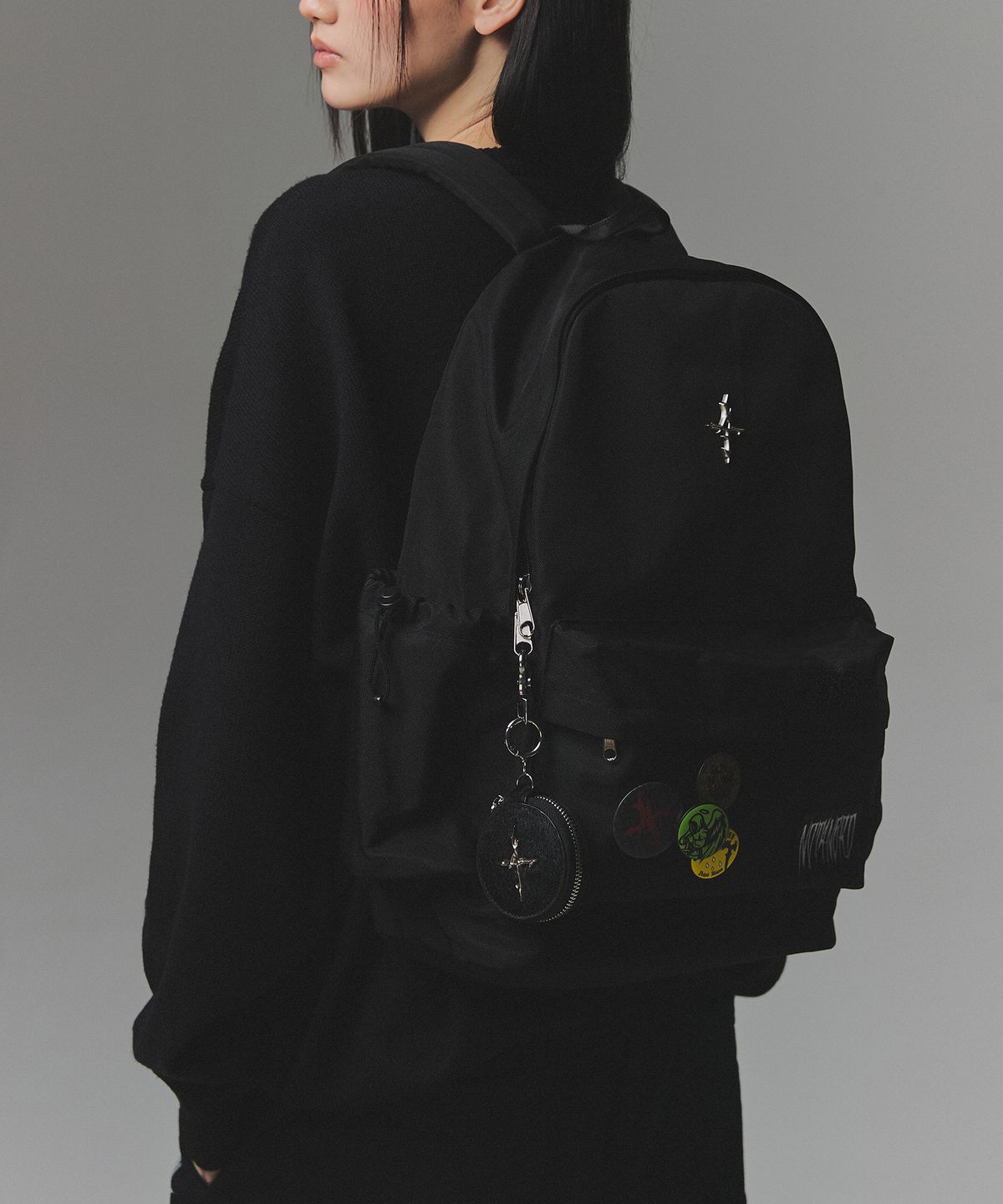 낫포너드(NOT4NERD) 4 Symbol Pendant Patch String Pocket Backpack - Black