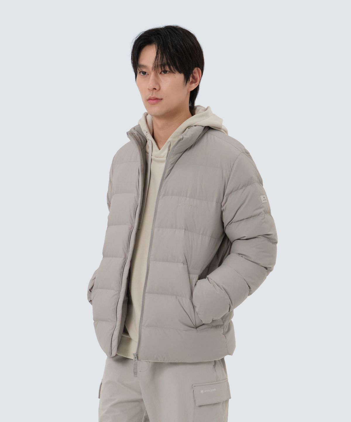 스노우피크 어패럴(SNOWPEAK APPAREL) 랜드에어 스탠드넥 경량 다운 자켓 (S25WMGDJ40) Warm Gray