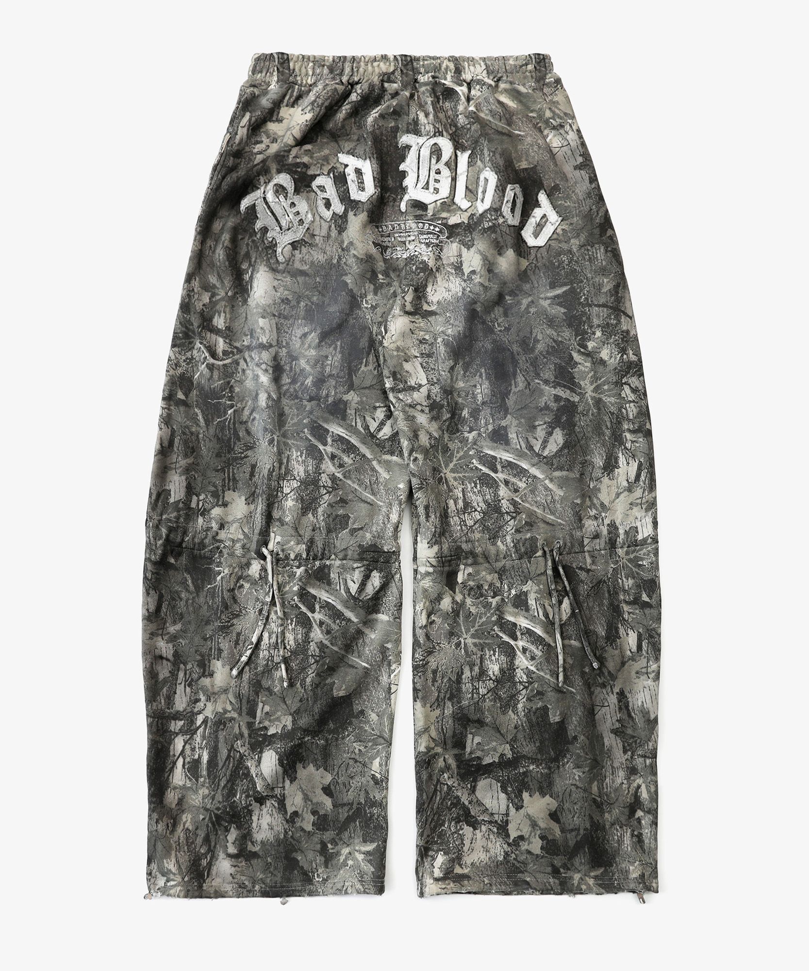 MUSINSA | BADBLOOD Lion Patch 2 Way Curved Jogger - Light Realtree