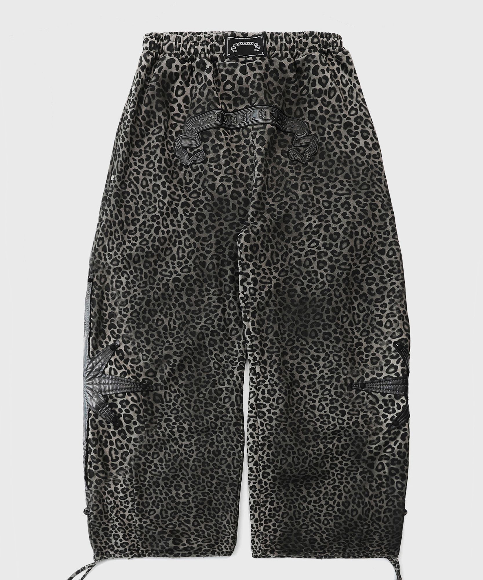 MUSINSA | BADBLOOD Cosmo Patch 2 Way Curved Jogger Trousers