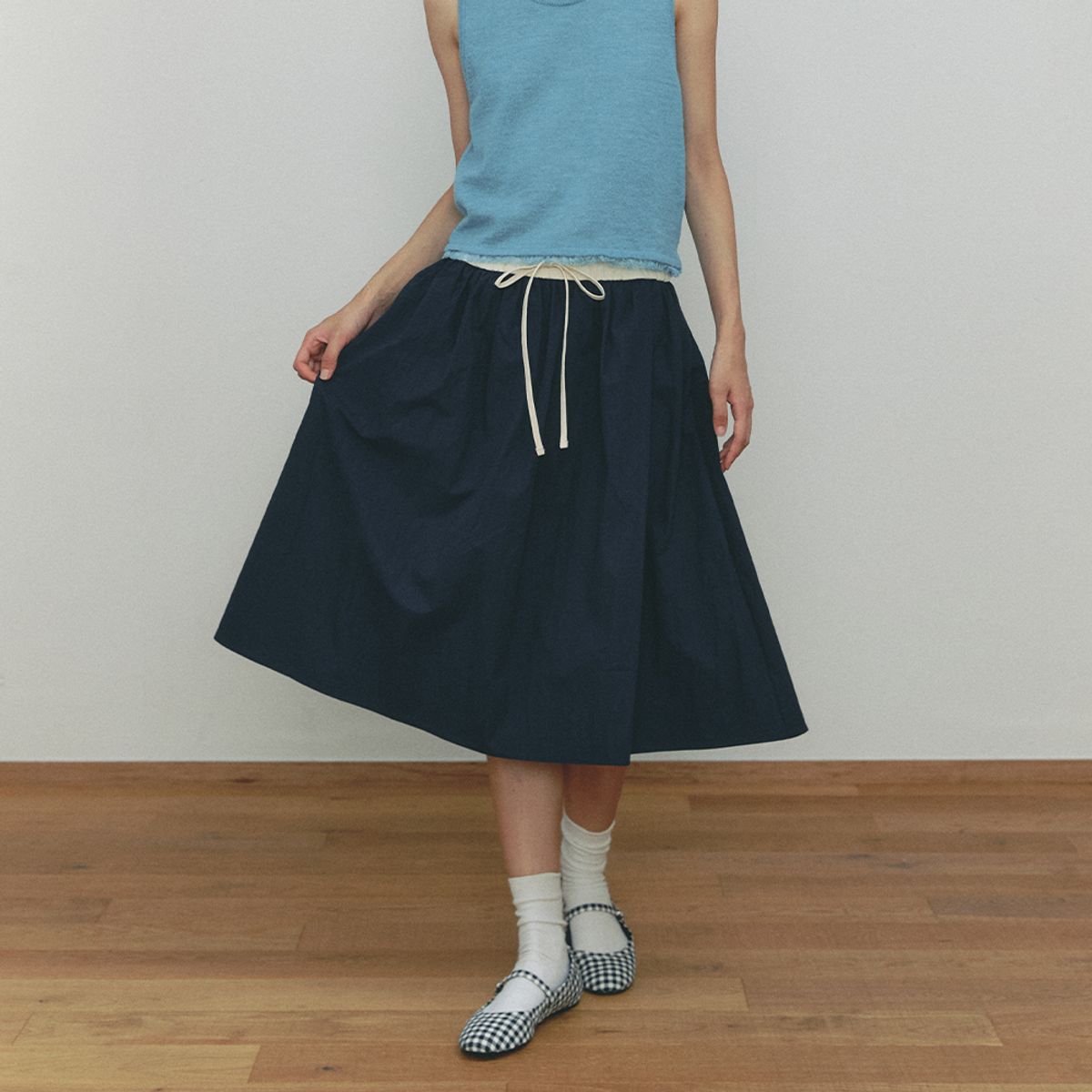 쎄미(SSEMI) BANDING ROPE MIDI SKIRT(NV)