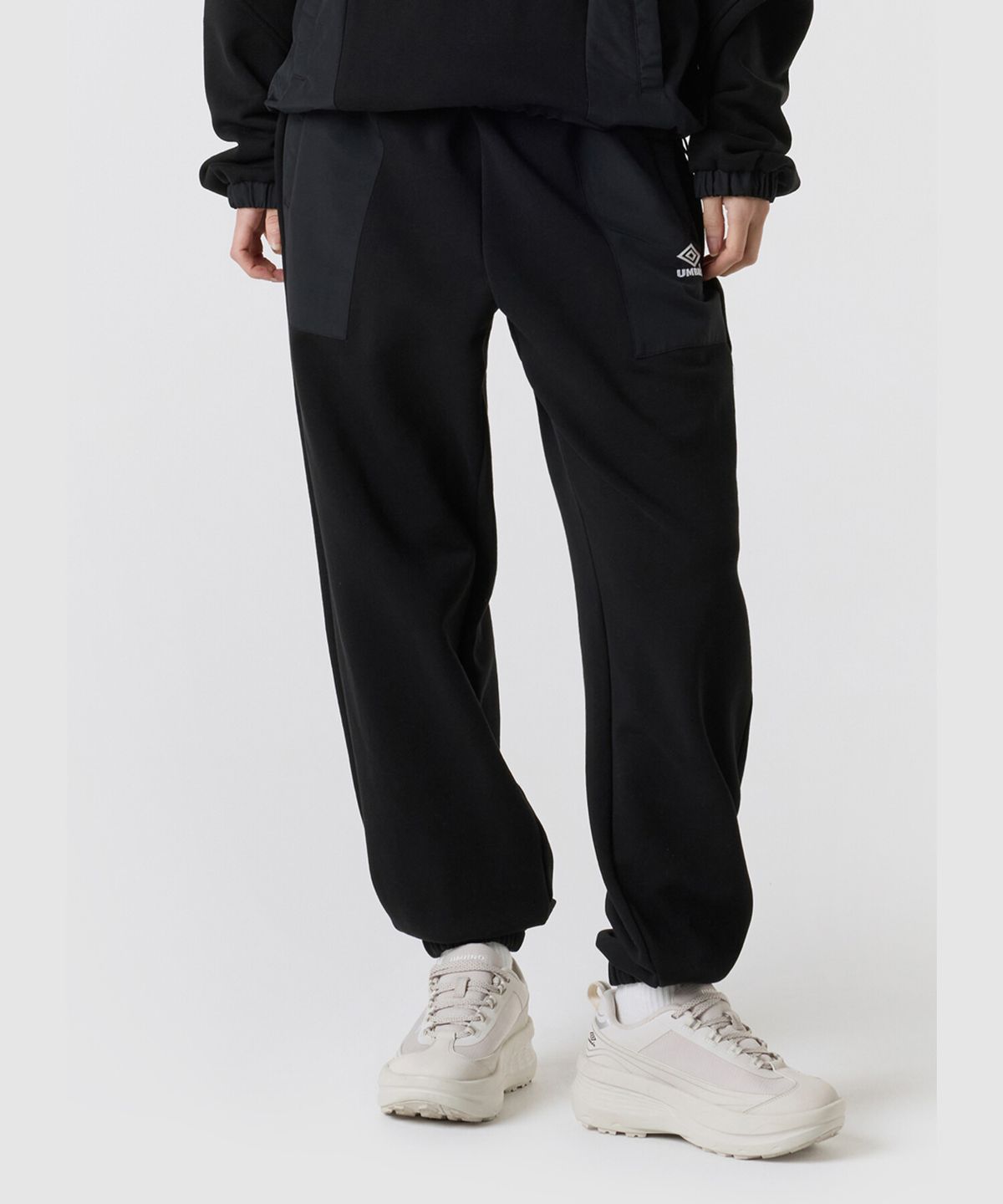 엄브로(UMBRO) HBL 하이브리드 니트 조거 팬츠 블랙(UQ321CFP97)