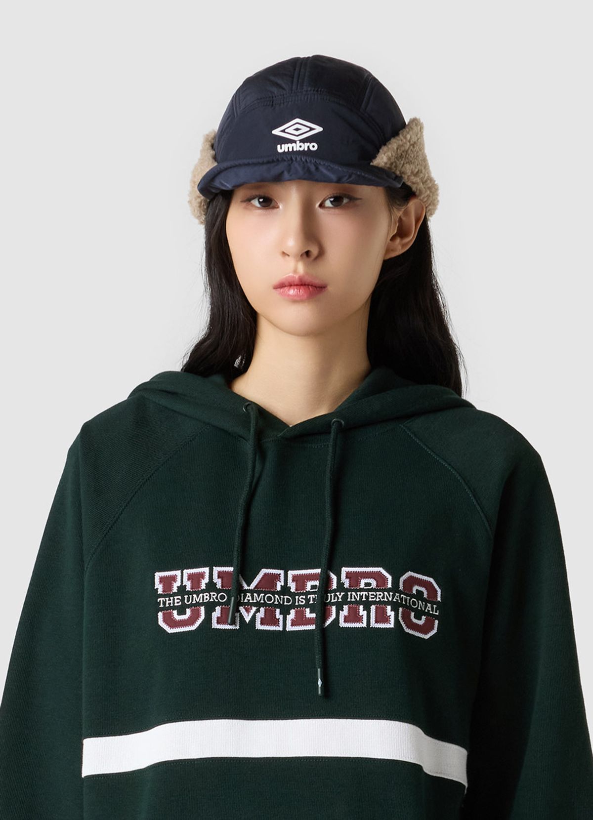 엄브로(UMBRO) 숏 이어플랩 캡 네이비 UQ423CCPO3