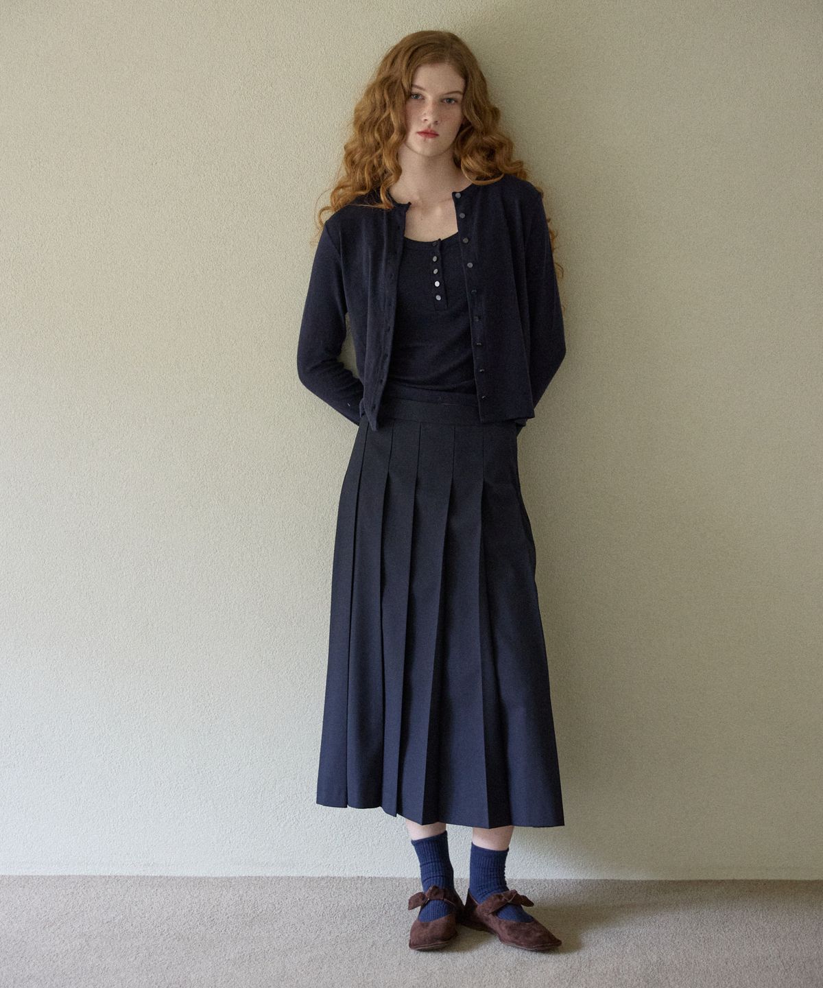 오픈도어스튜디오(OPENDOORSTUDIO) medium long  pleated skirt navy