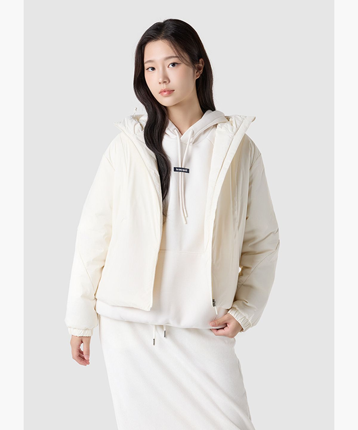 르꼬끄(LECOQ) 여성 네쥬 루즈핏 숏 패딩 자켓 - 아이보리 QQ422OPDO1