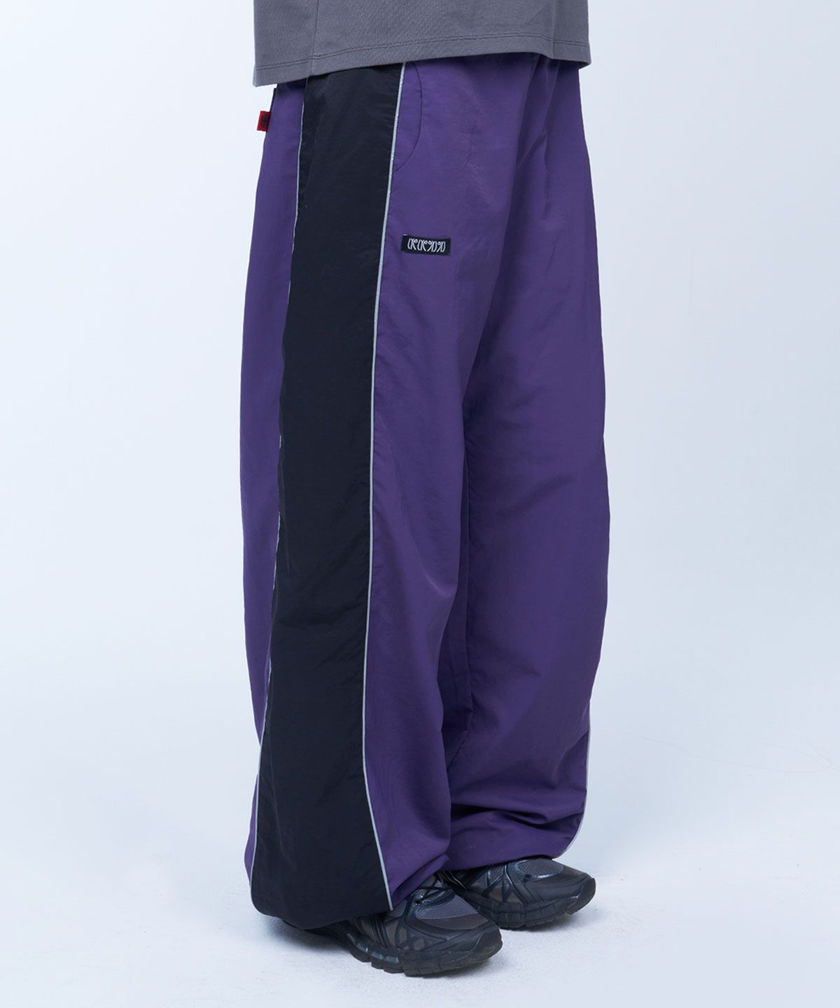 라이라이(LYELYE) Side piping nylon pants (violet)