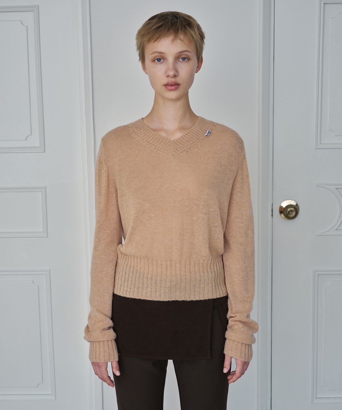 시메트릭 퍼센트(SYMMETRICPERCENT) Baby Logo Knit Top / Peach Beige