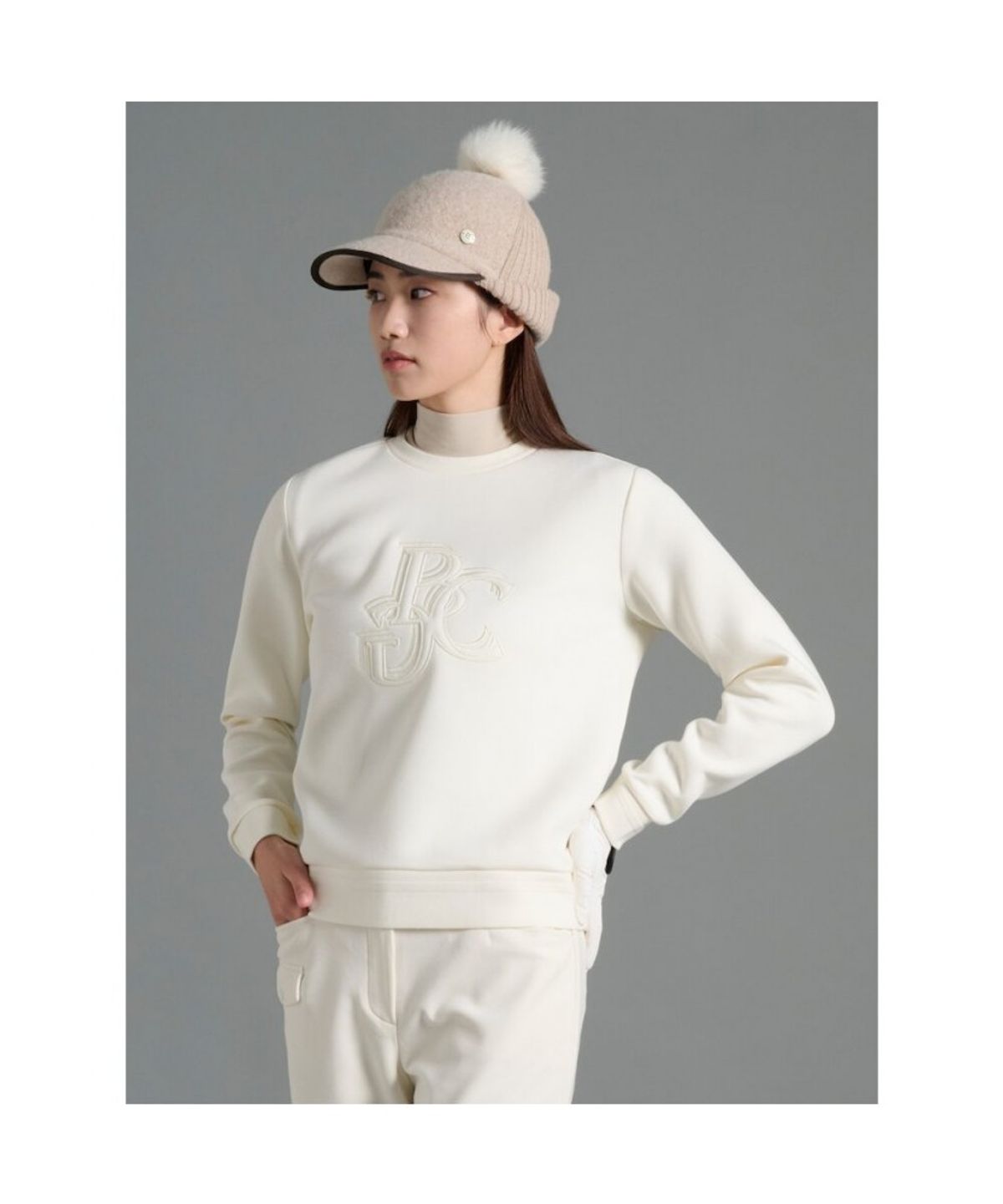 빈폴골프(BEANPOLE GOLF) 여성 라운드넥 블루종핏 긴소매 티셔츠 - 아이보리