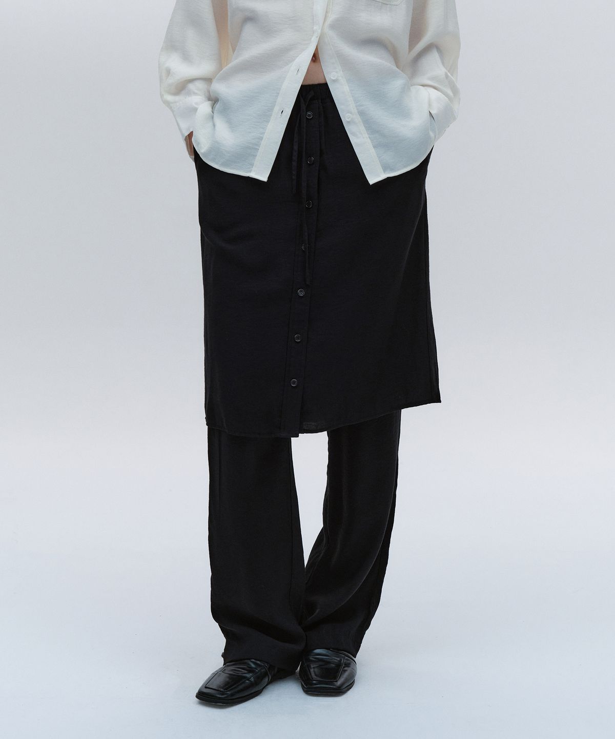 솔티페블(SALTY PEBBLE) SOFT TWILL SKIRT PANTS [BLACK]