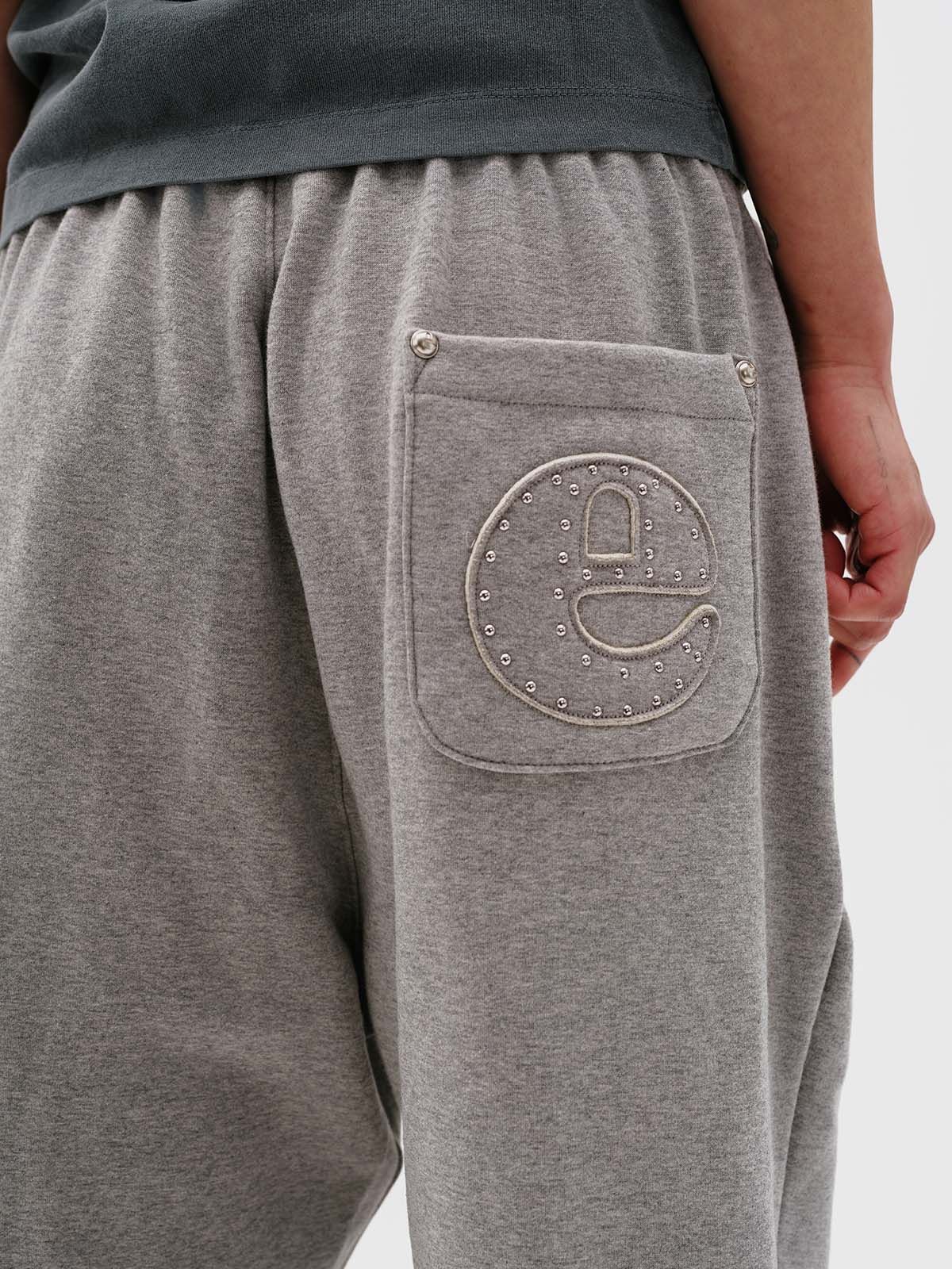 이피티(EPT) STUDDED JOGGER PANTS (MELANGE)