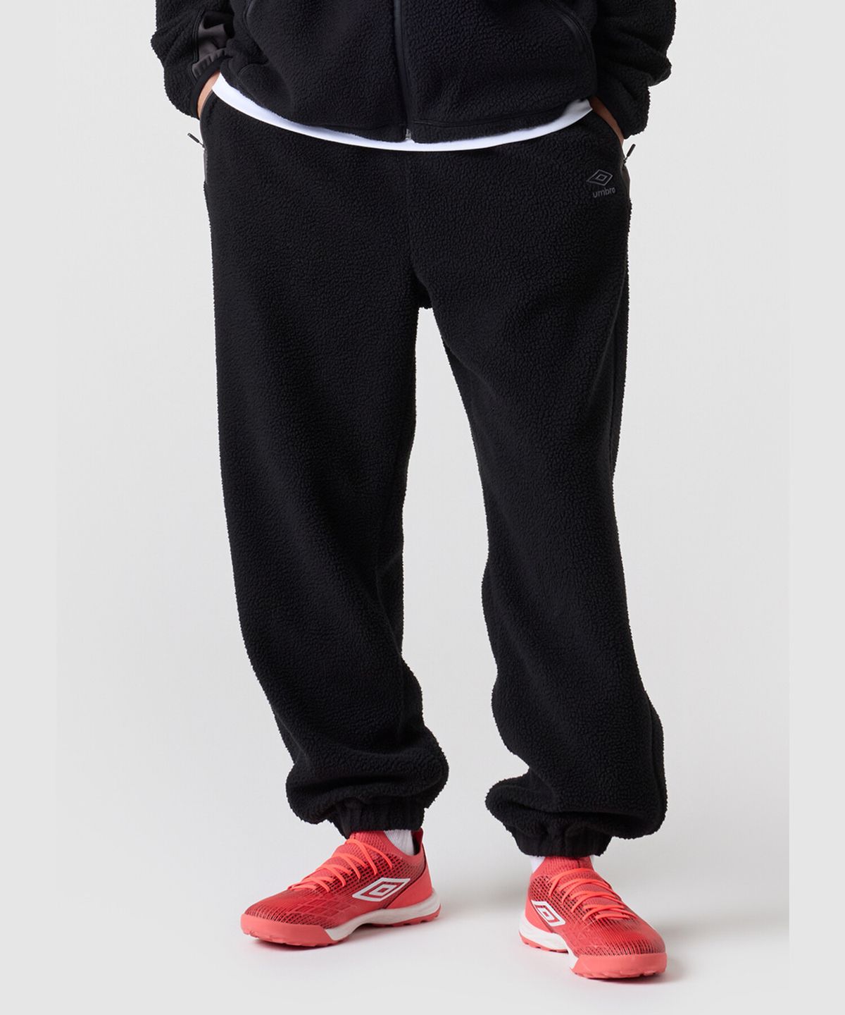 엄브로(UMBRO) 하이브리드 플리스 조거 팬츠 블랙 UQ421SFPO2