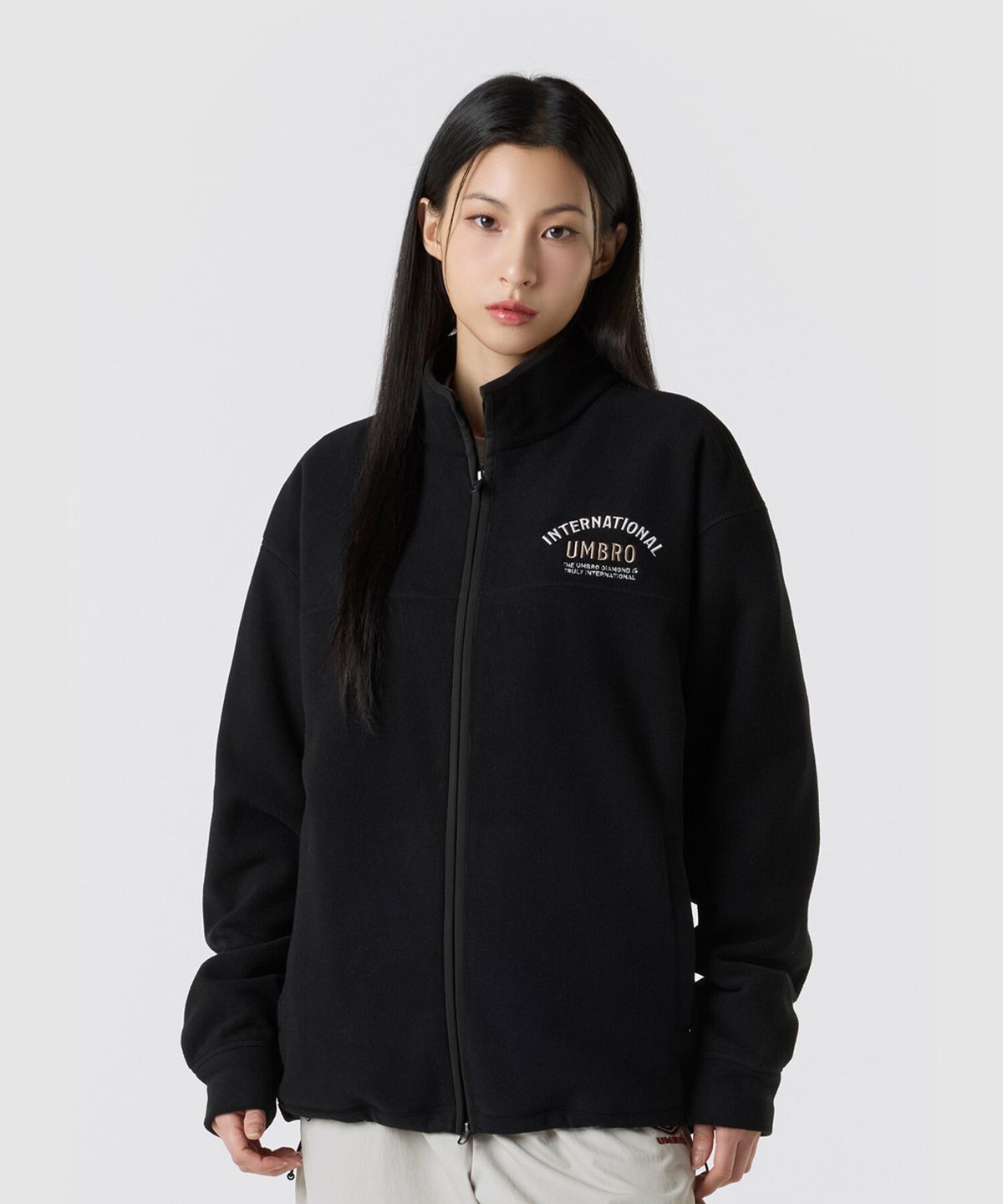 엄브로(UMBRO) 플러스플리스 스탠넥 집업 자켓 블랙 UQ421CFTN1