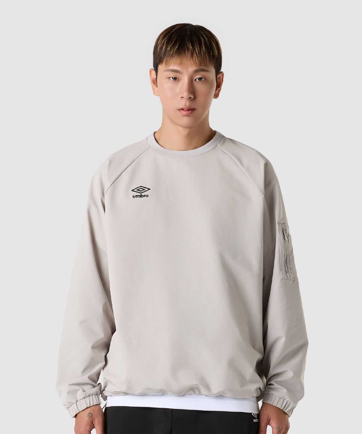 엄브로(UMBRO) 폴라 스트레치 기모 포켓 피스테 베이지 UQ421SWTO2